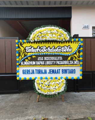 Papan Bunga Duka di Mapanget Barat